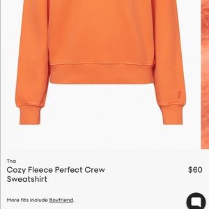 Orange crewneck from TNA aritzia